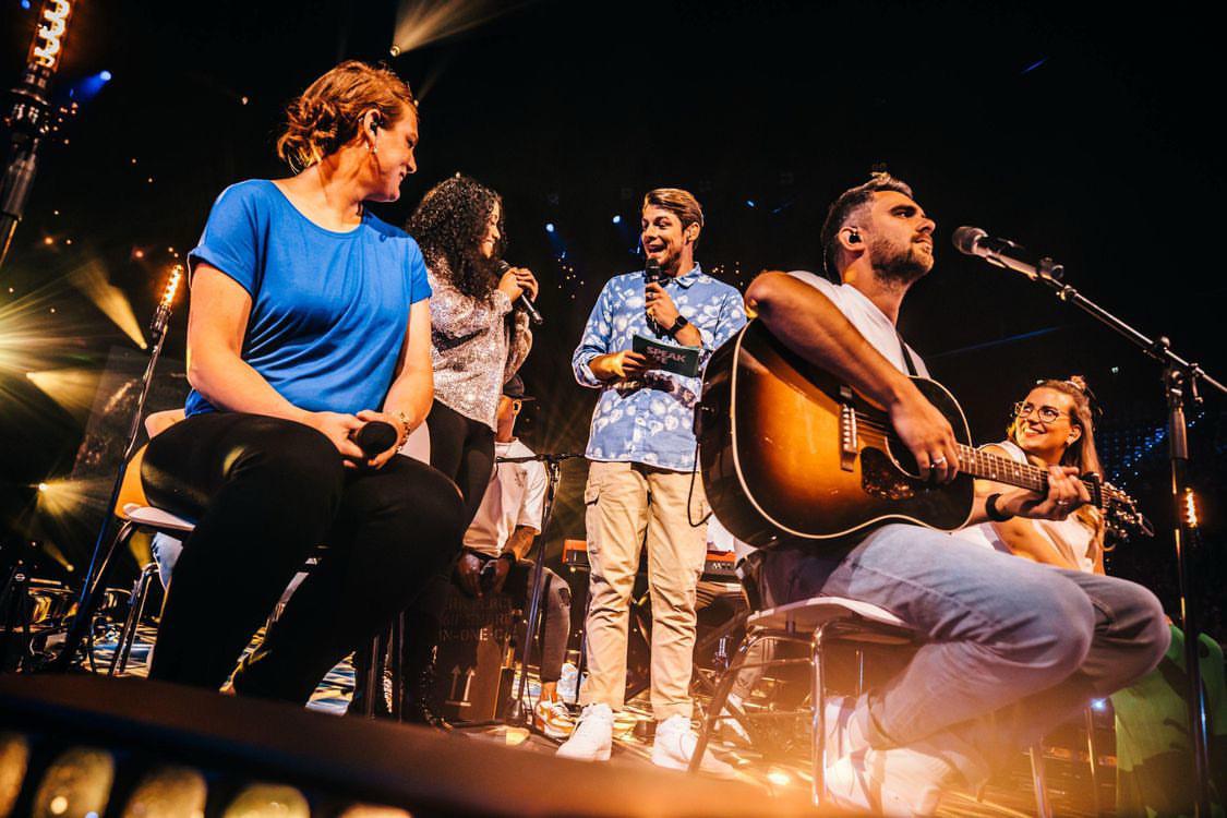 Ilaisa performing her original song “Speak Life” and sharing testimony with acoustic band at EO Jongerendag